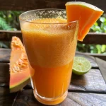 Close-up of a refreshing watermelon juice with mint leaves.