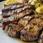 Close-up of juicy Tilápia Assada with herbs and spices.