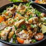 Close-up of Lemon Chicken Pasta with fettuccine, chicken, and herbs.