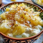 Yogurt bark with pineapple and coconut, cut into pieces.